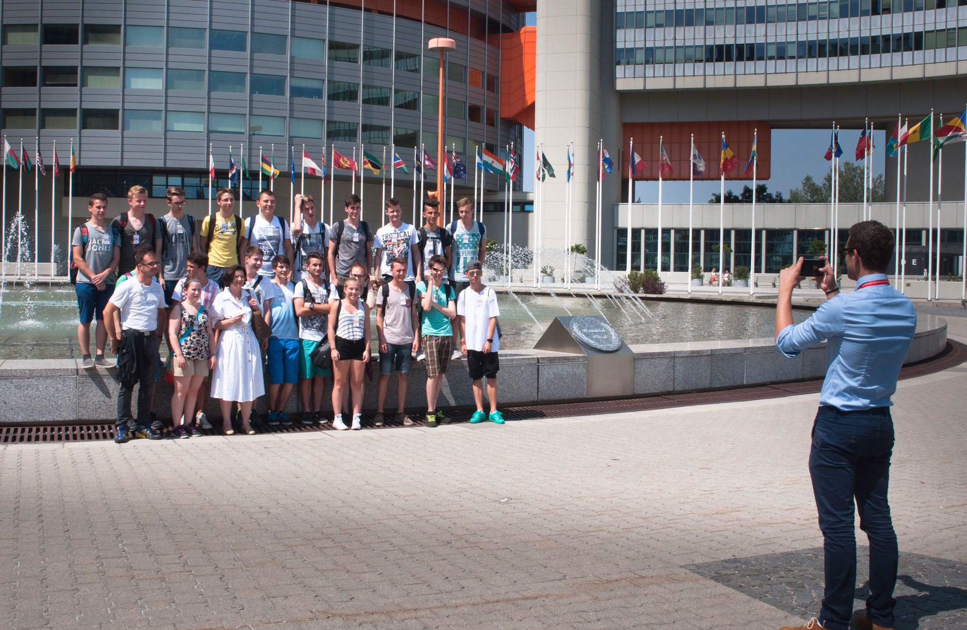 School class posing for group photo on UN Vienna Memorial Plaza School class posing for group photo on UN Vienna Memorial Plaza